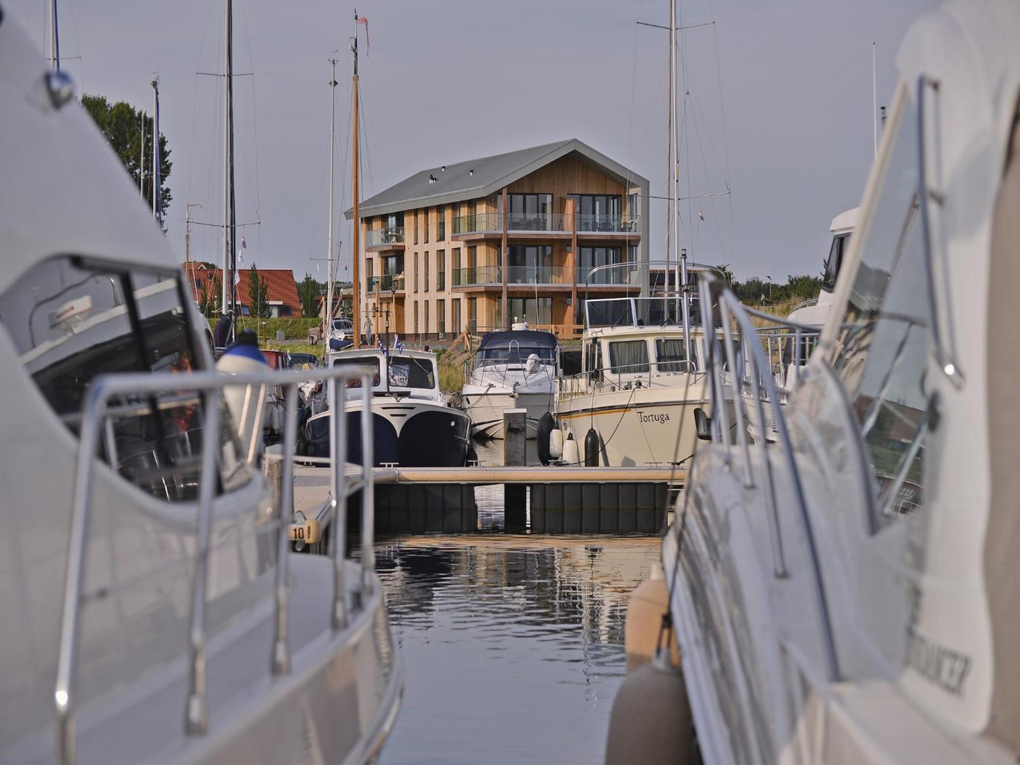Waterlodge Blue Lagoon On A Jetty For 4 People Kamperland Extérieur photo