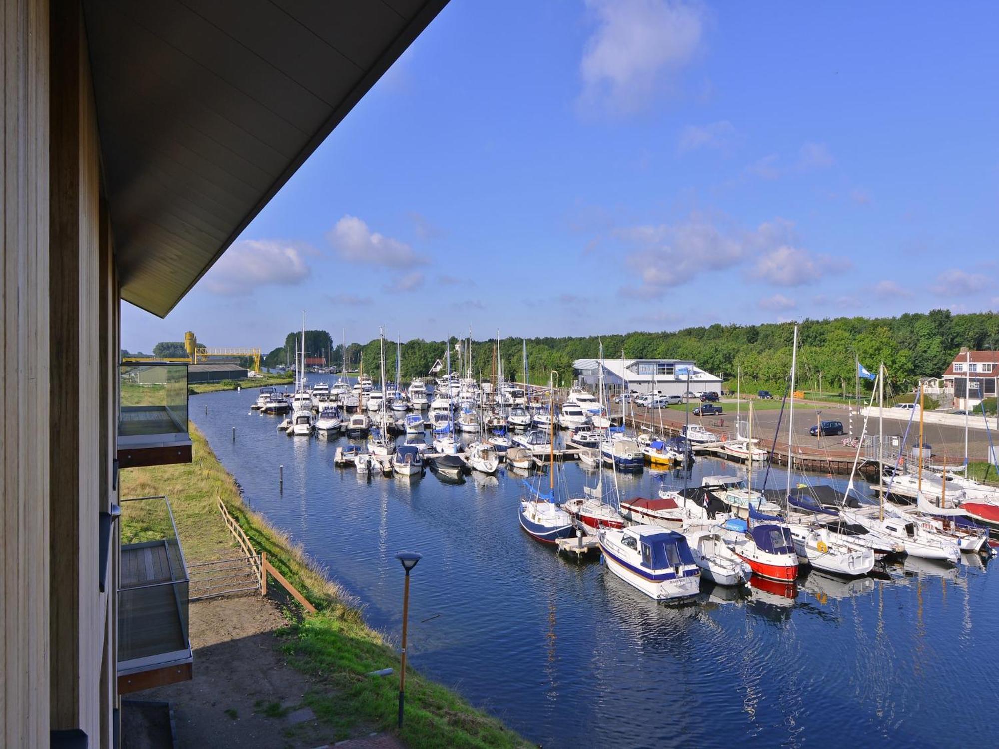 Waterlodge Blue Lagoon On A Jetty For 4 People Kamperland Extérieur photo
