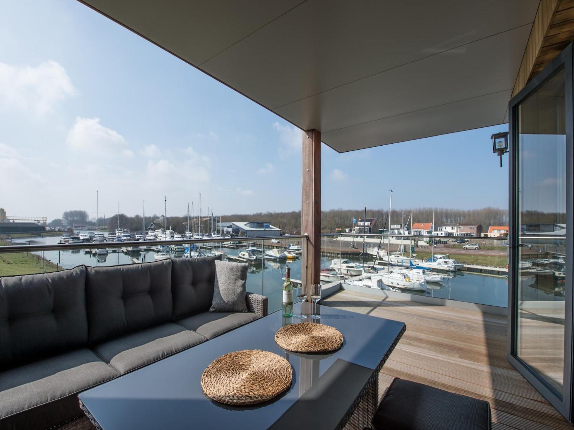 Waterlodge Blue Lagoon On A Jetty For 4 People Kamperland Extérieur photo